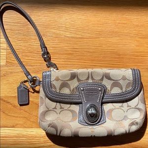 Coach wristlet. Brown